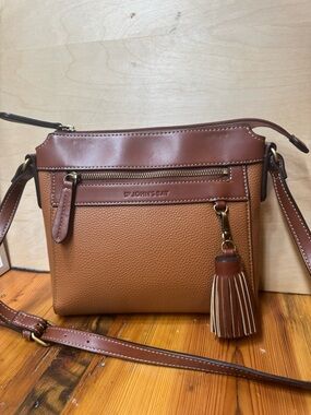 St. John's Bay Brown and Tan Crossbody Bag with Tassel Charm